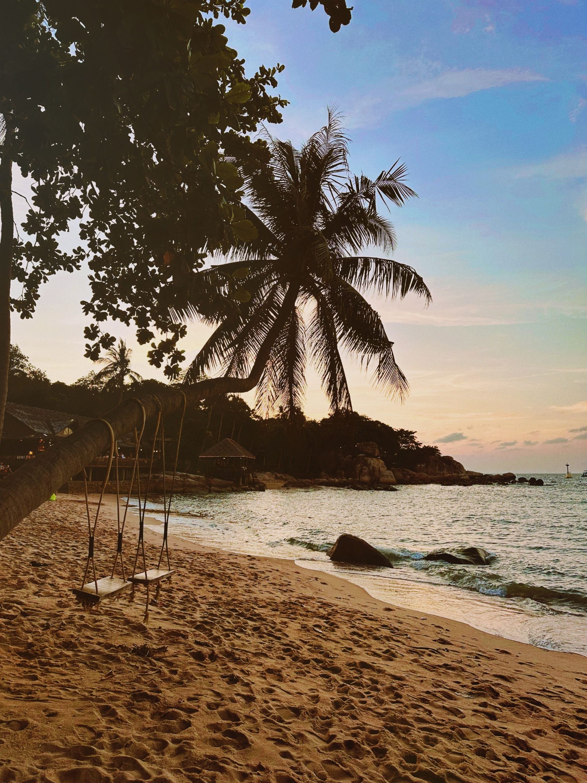 Beach swing at golden hour outside Carabao Diving Resort, Chalok Bay