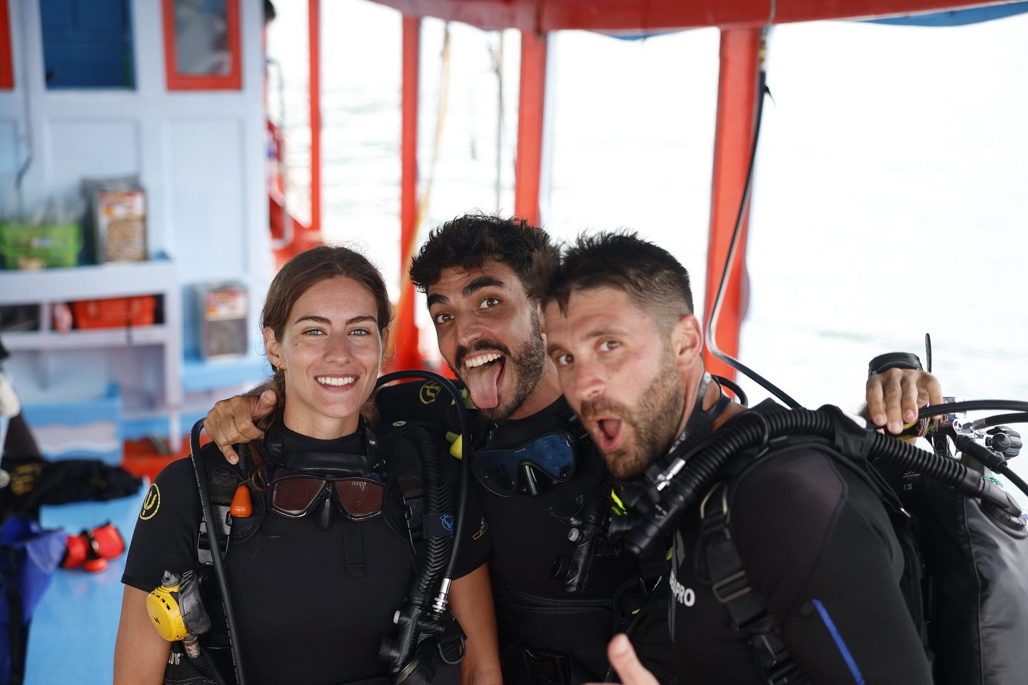 New divers geared up and excited for their first scuba dive with Carabao, Koh Tao