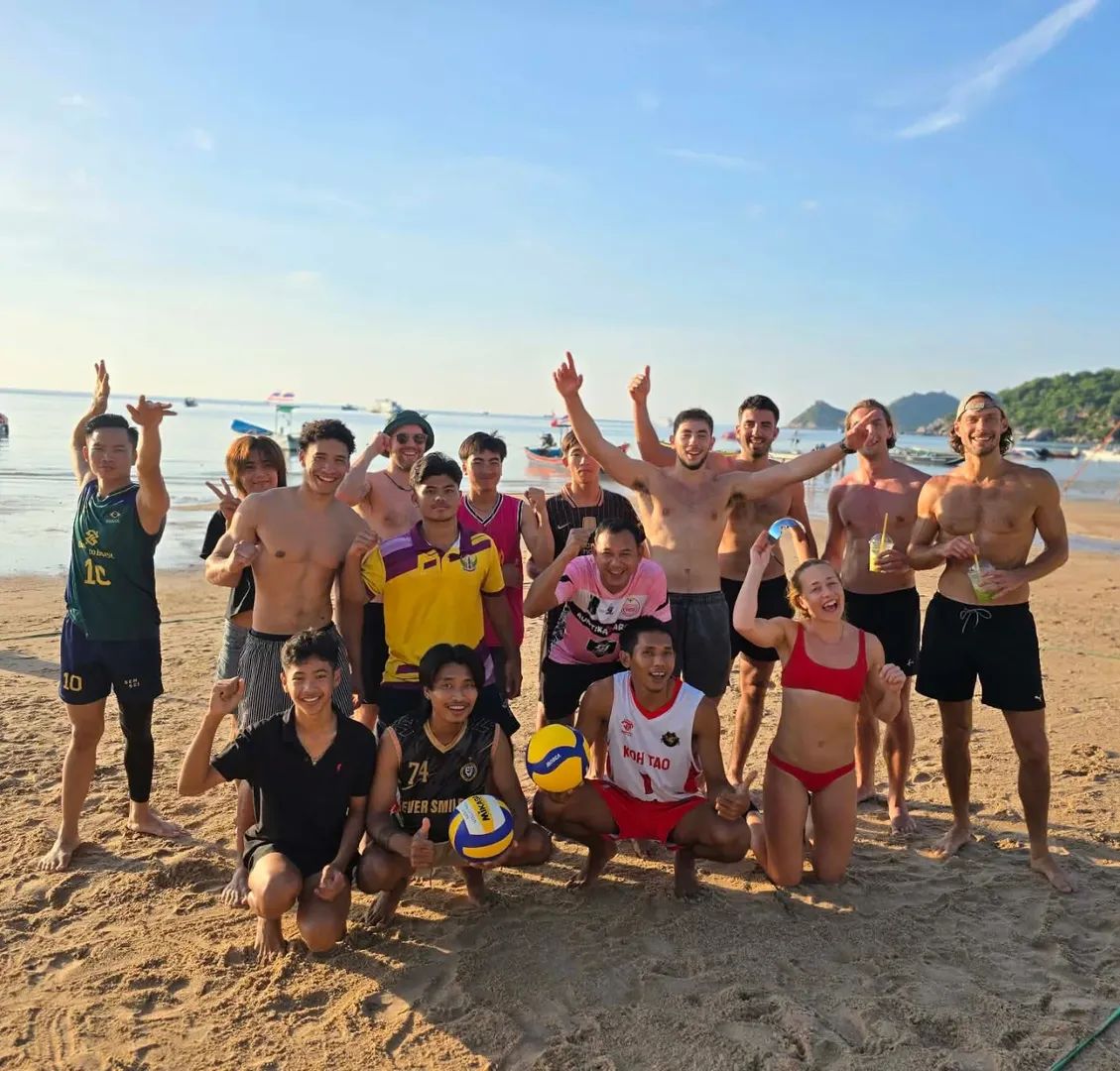 Divers and friends from around the world together on the beach at Carabao Diving Resort, Koh Tao